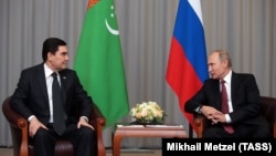 Russian President Vladimir Putin (right) meets with his Turkmen counterpart Gurbanguly Berdymukhammedov on the sidelines of a CIS summit in Sochi in 2017. 