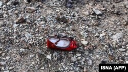 A child's shoe is pictured at the crash site of the Ukrainian airliner that was shot down over Tehran on January 8.