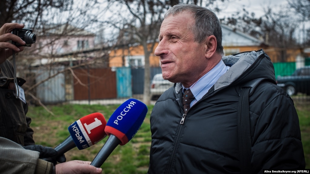 Mykola Semena speaks to journalists on March 20.