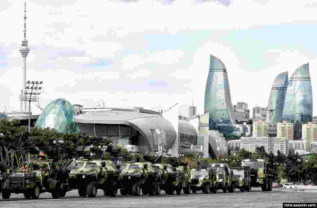 A column of military vehicles participates in a rehearsal of a military parade in Baku, Azerbaijan. (AFP/Tofik Babayev)