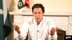 Imran Khan addresses the nation from his residence in Islamabad a day after the general elections on July 26.