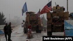 Vehicule militare americane la un punct de control în Siria, 30 decembrie 2018