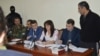 Nagorno Karabakh - Shahbaz Quliyev (R) and Dilgam Askerov (third from left), Azerbaijani men charged by Karabakh's authorities with sabotage, stand trial in Stepanakert, 27Oct2014.