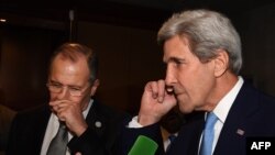 Министр иностранных дел России Сергей Лавров и государственный секретарь США Джон Керри.