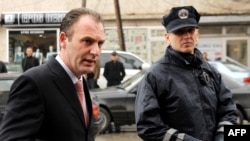 Former Kosovo Liberation Army commander Fatmir Limaj (left) at the District Court in Pristina (file photo)