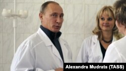 Владимир Путин и Татьяна Голикова (архивное фото)