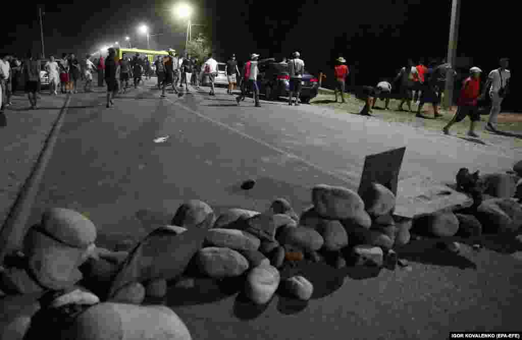 Rocks on a road leading to the compound.