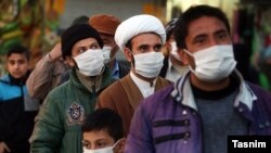 Residents of Qom, the epicenter of coronavirus outbreak in Iran, waiting to be examined by a mobile medical team. February 27, 2020. 