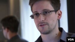 АҚШ расмийлари томонидан жосусликда айбланаётган Эдвард Сноуден.
