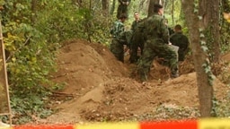 Gardisti Dragan Jakovljević i Dražen Milovanović poginuli su 5. oktobra 2004. u tajnom vojnom objektu Karaš u Topčideru Gardisti Dragan Jakovljević i Dražen Milovanović poginuli su 5. oktobra 2004. u tajnom vojnom objektu Karaš u Topčideru
