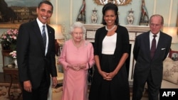 U.S. President Barack Obama (left) and his wife Michelle (second right) meet with Queen Elizabeth II (second left) and Prince Philip, the Duke of Edinburgh at Buckingham Palace in London