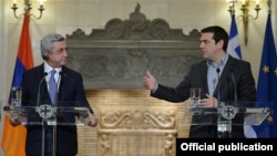 Greece - Prime Minister Alexis Tsipras (R) speaks at a joint news conference with Armenian President Serzh Sarkisian, Athens, 16Mar2016.