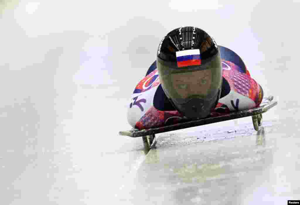 Russia&#39;s Yelena Nikitina speeds down the track during the women&#39;s skeleton event. She won bronze, coming third behind British gold-medal winner Elizabeth Yarnold.