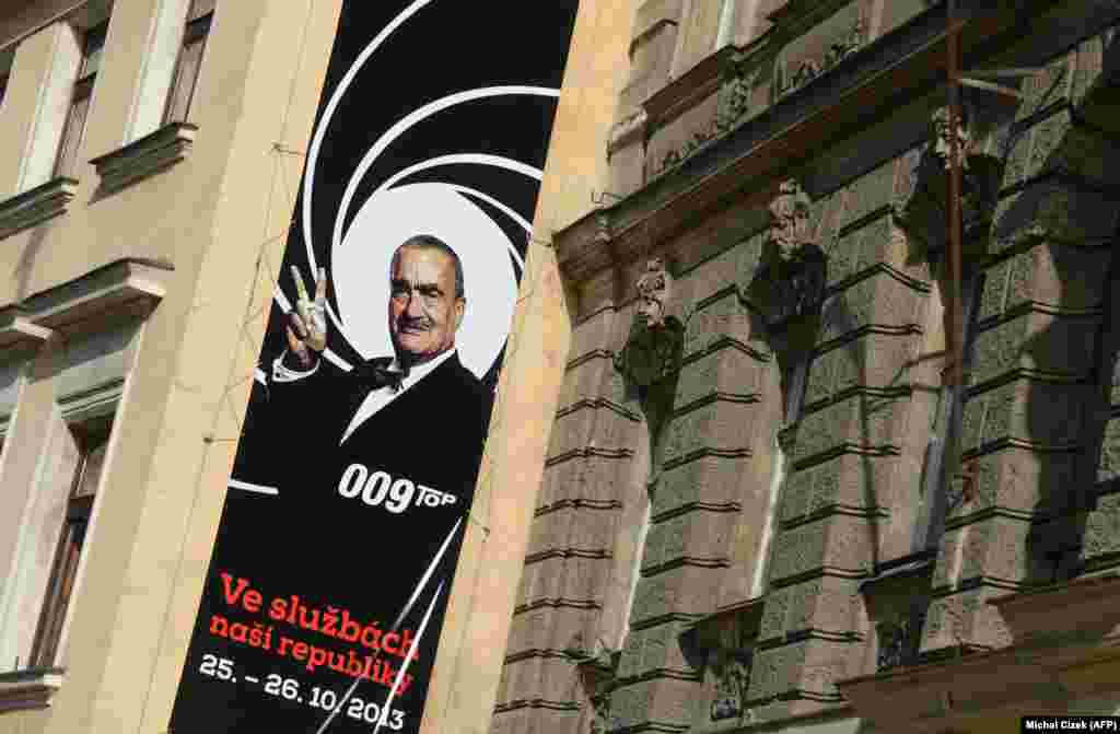 A campaign banner in Prague reading "In the service of our country" and featuring the chairman of the center-right Top 09 party, Karel Schwarzenberg; it mimicks a look from the 007-James Bond films.