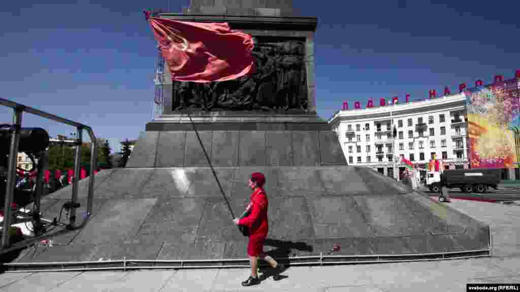 A Belarusian child flies the flag of the former Soviet Union during Victory Day celebrations in Minsk.&nbsp;