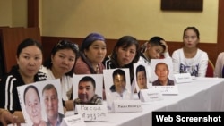 Relatives of ethnic Kazakhs who have been forcibly detained in internment camps in China hold a public meeting in Almaty in 2018 to ask for help from the UN and the Kazakh government to help secure their release.