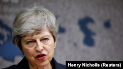 U.K. - Britain's Prime Minister Theresa May speaks at Chatham House in London, Britain July 17, 2019