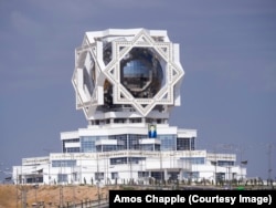 The palace, which is reserved for wedding ceremonies, features a glass globe spanned by a titanium map of Turkmenistan and includes a portrait of President Gurbanguly Berdymukhammedov.