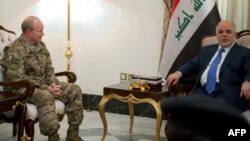 الجنرال مارتن ديمبسي، رئيس هيئة الاركان الاميركية المشتركة في لقاء مع رئيس الوزراء حيدر العبادي، بغداد 9 آذار 2015
