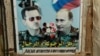 Плакат в сирийском городе Латакия, изображающий президента Сирии Башара Асада и Владимира Путина