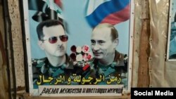 Совместная российско-асадовская пропаганда на улице в городе Тартус