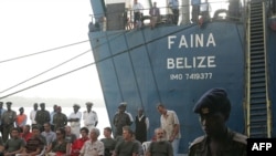 The crew of the Faina celebrate their release before their departure for Ukraine