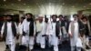 FILE: Taliban attend a meeting in Moscow in May. 
