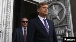 Ambasadorul Michael McFaul la ministerul rus de externe, în 2013