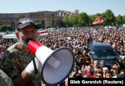 Armenian opposition leader Nikol Pashinian addresses supporters during a rally in Yerevan on April 25.