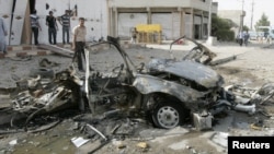بقايا سيارة مفخخة إنفجرت في كركوك 16 آب 2012