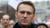 Алексей Навальный на оппозиционном митинге в Москве