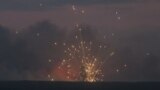 Russia - explosions at an arms depot sent balls of fire into the sky near the Siberian city of Achinsk - screen grab - Reuters