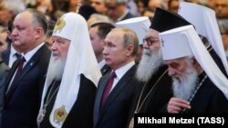 Președinte Vladimir Putin și Igor Dodon la aniversarea a zece ani de la instalarea Patriarhului Kiril, 31 ianuarie 2019