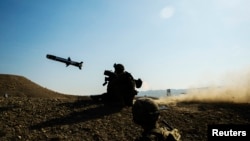 Иллюстративное фото. Американский солдат запускает противотанковую ракетную установку «Джавелин» во время учений в провинции Лагман. Афганистан, 1 января 2015