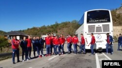 Red Star Belgrade players wait at the Jarinje border crossing in northern Kosovo on October 9.
