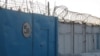 Ворота тюрьмы в Казахстане. Иллюстративное фото. 