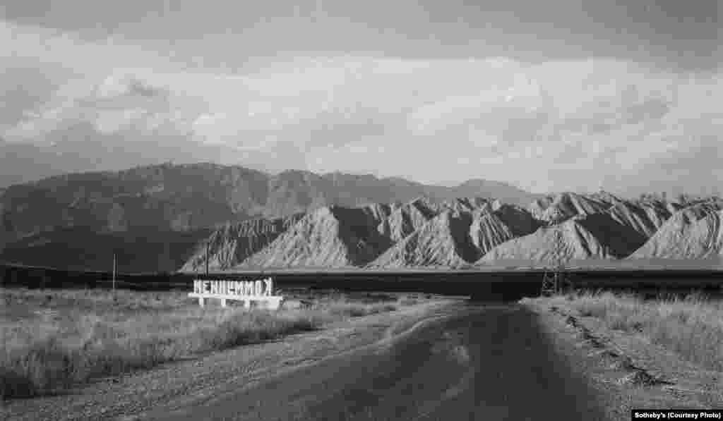 “Mirages of Communism #1,” a 1994 photograph by Alimjan Jorobaev (b. 1962) of Kyrgyzstan. “Mirages” is part of a photographic series documenting the breakdown of the Soviet Union.