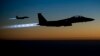 Американские истребители F-15 возвращаются после ударов по позициям исламистов в Сирии.