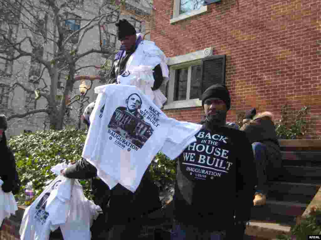T-shirts reading “Back in the house we built” make reference to the construction of the White House by black slaves. - obama20 Ricki Green