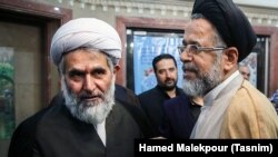 حسین طائب رئیس سازمان اطلاعات سپاه در کنار محمود علوی وزیر اطلاعات دولت حسن روحانی