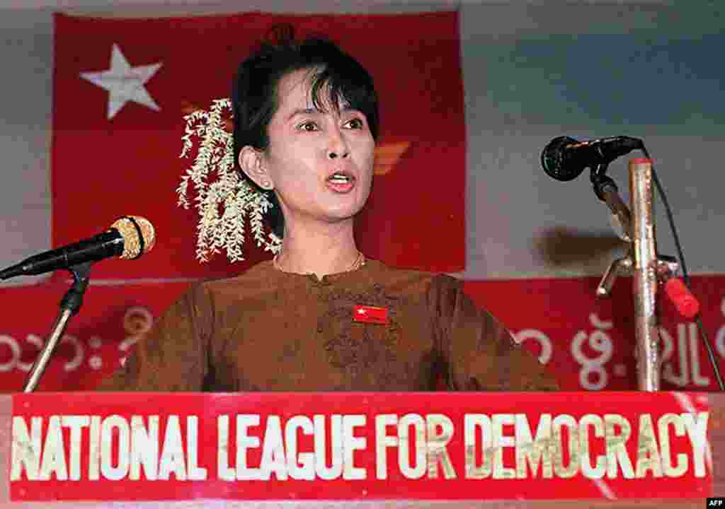 Suu Kyi addresses a gathering of supporters at her residential compound in Yangon on January 4, 1997, to mark the 49th anniversary of the country's independence movement.
