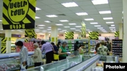 Armenia -- Shoppers in a food supermarket in Yerevan.