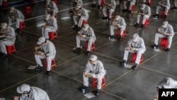 Martie 2020: pauza de prânz la fabrica Honda de la Wuhan, din China, sursa pandemiei de coronavirus. 