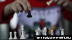 Долю золотих медалей Всесвітньої шахової олімпіади вирішили додаткові показники