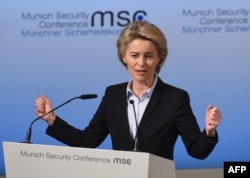 German Defense Minister Ursula von der Leyen delivers an opening statement on the first day of the Munich conference.