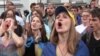 WATCH: (Discretion advised: GRAPHIC LANGUAGE) Ukrainian protesters joined in a profane chant aimed at Russian President Vladimir Putin at a June 16 rally outside Russia's consulate in Kharkiv. The protest came two days after Ukrainian Foreign Minister Andriy Deshchytsya made the same abusive remark about Putin when he spoke to anti-Russian protesters in Kyiv. (Video by RFE/RL's Ukrainian Service)