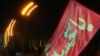 Pilgrims walk towards the holy southern city of Karbala to mark the 40th day after Ashura on February 12.