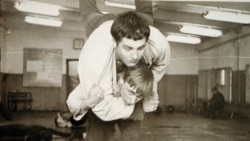 A young Vladimir Putin in a judo training fight at a St. Petersburg sports school in 1971.