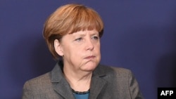 Анґела Меркель на саміті ЄС 12 лютого після безсонної ночі переговорів у Мінську