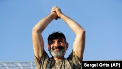 ARMENIA -- Opposition lawmaker Nikol Pashinian gestures as he addresses his supporters in Republic Square in Yerevan, May 2, 2018